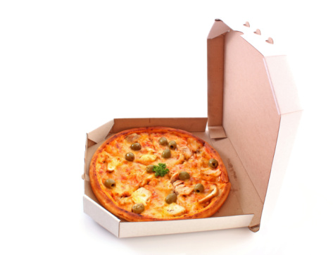 Whole pepperoni with olives pizza in box over white background